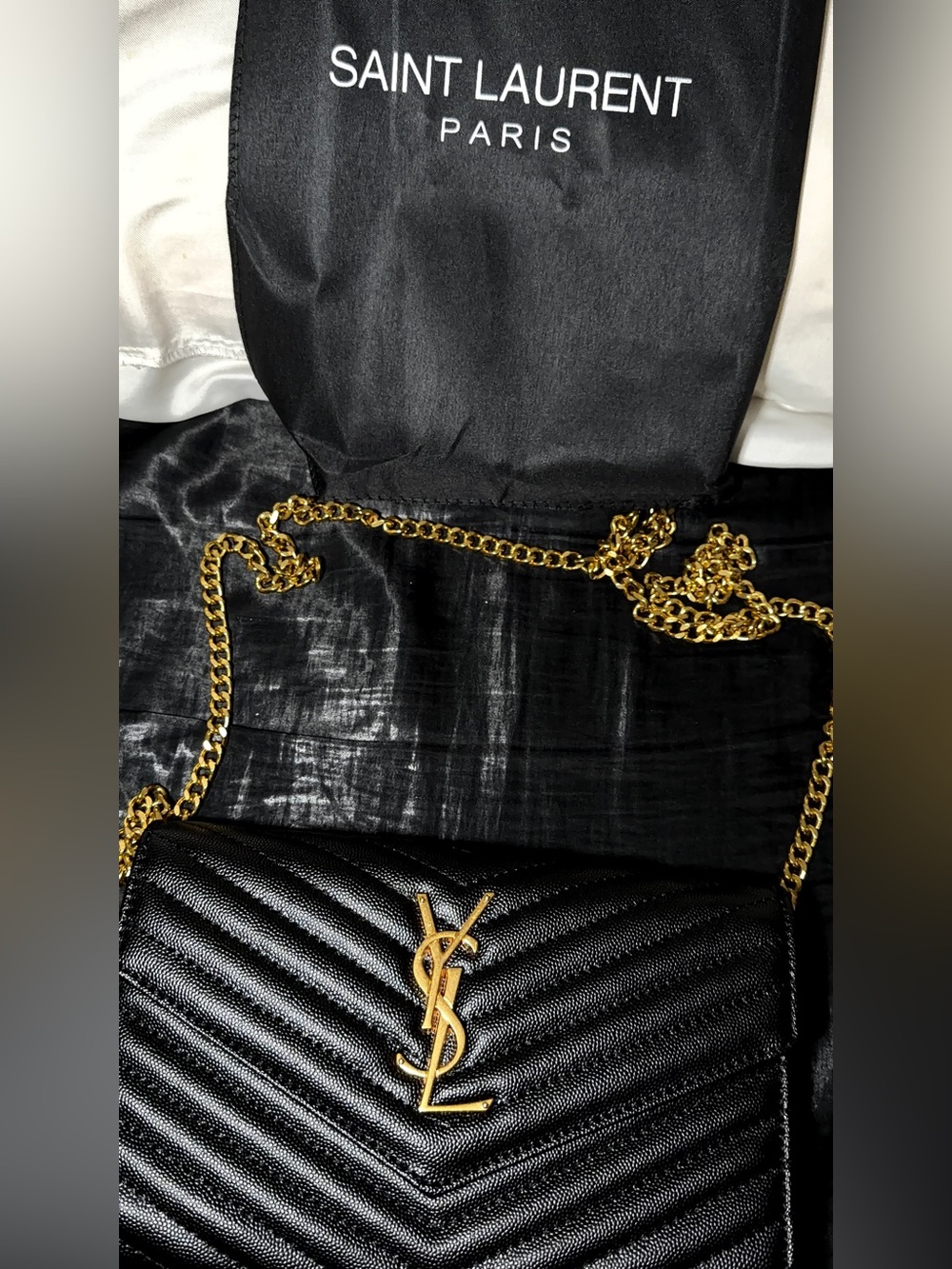 Saint Laurent Black Chevron Quilted Clutch with Gold YSL Emblem